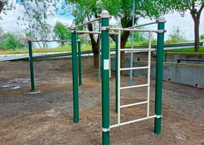 Calisthenics park with exercise cage and snake bar.