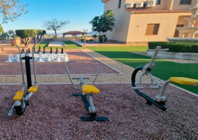 Outdoor gym with 3 fitness equipment.